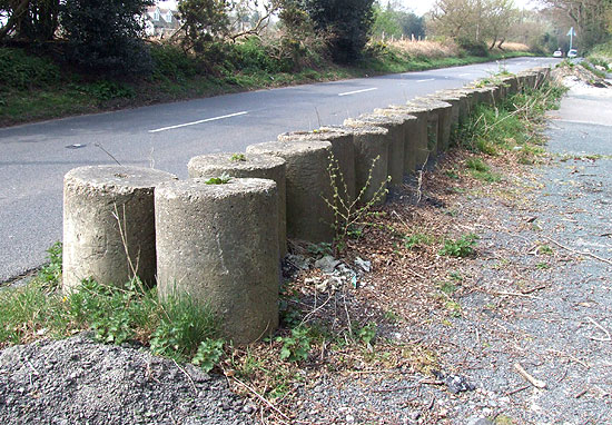 Line of roadblock cylinders